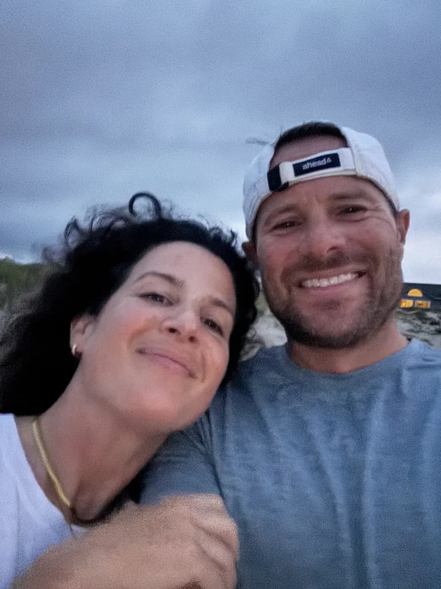 Brent and a woman smiling together in a close selfie