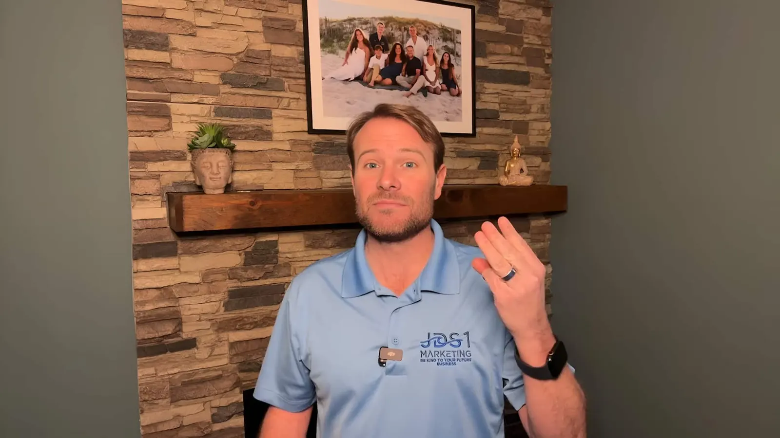 Brent Nickles in a JDS1 polo, talking to camera in his home office